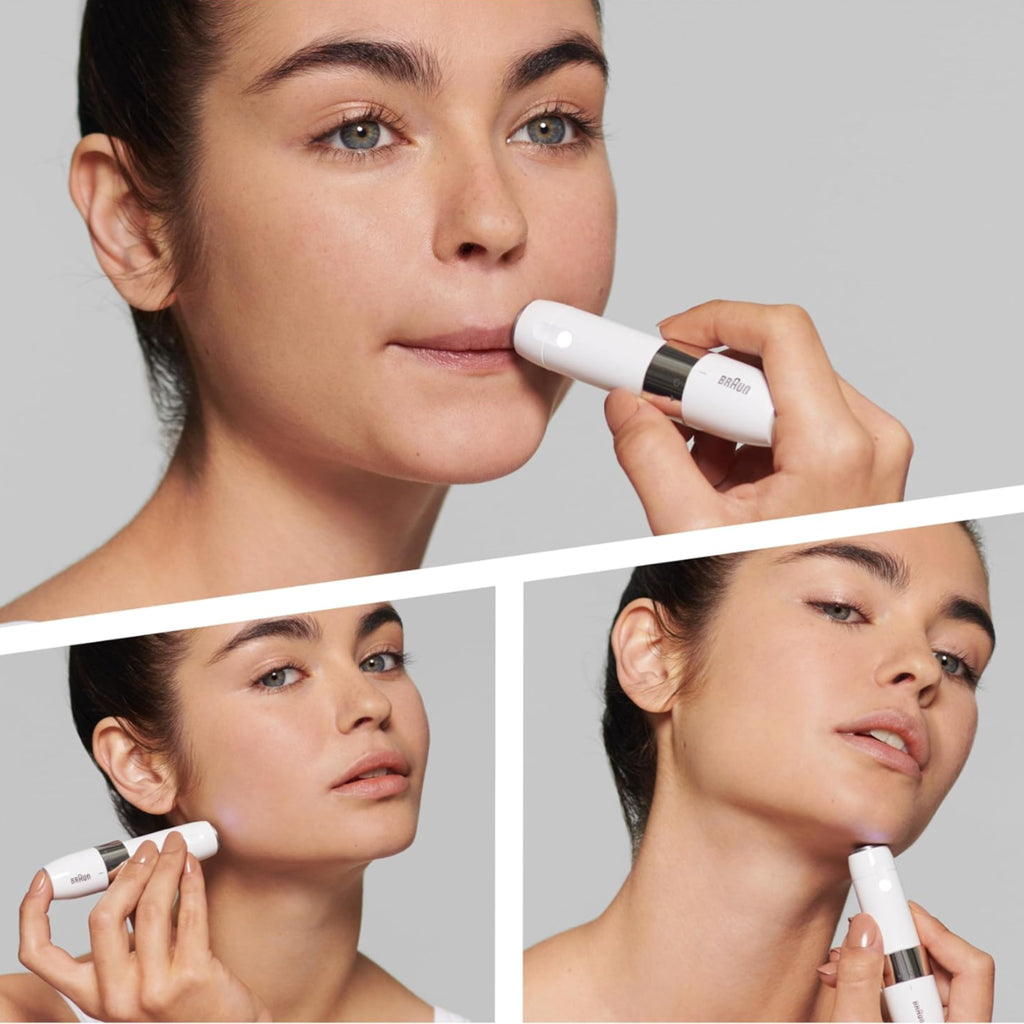 Woman using a skincare device on her face with a gray background